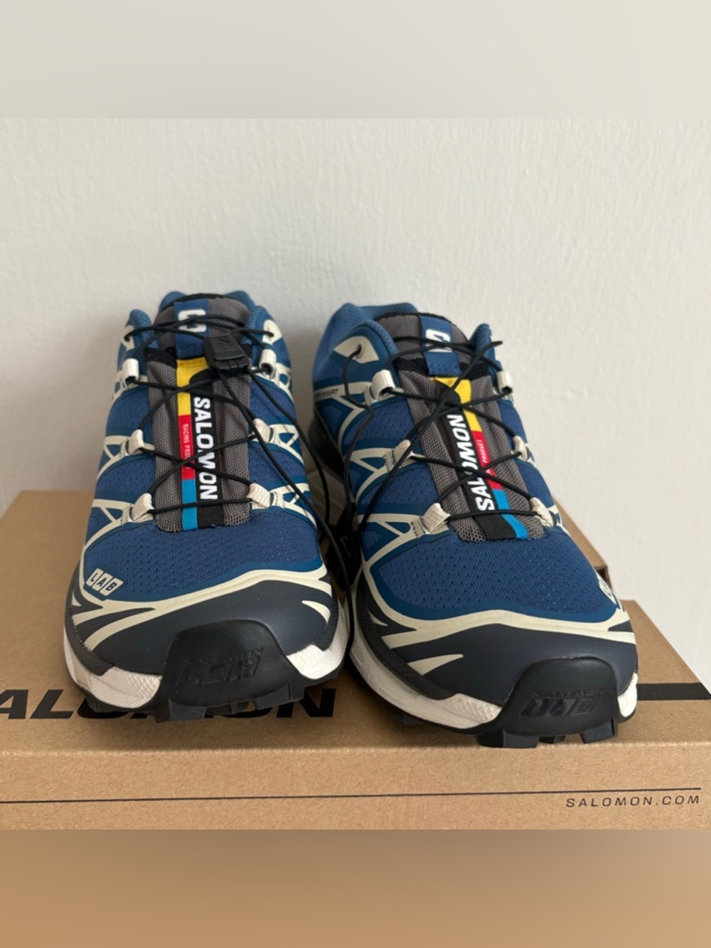 Salomon Men’s Blue Trail Sneakers with Yellow Accent